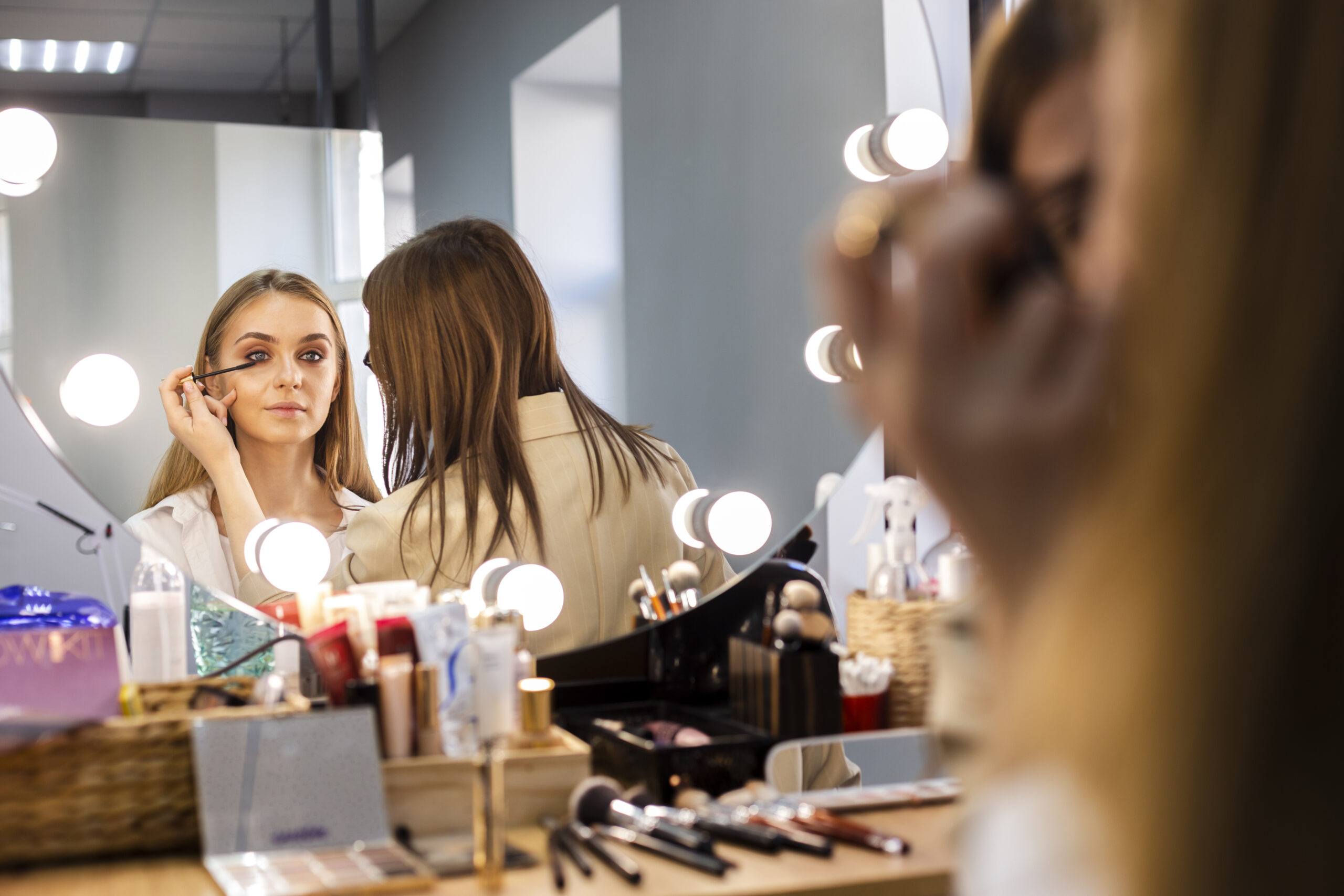 make-up-artist-applying-mascara-eyelashes