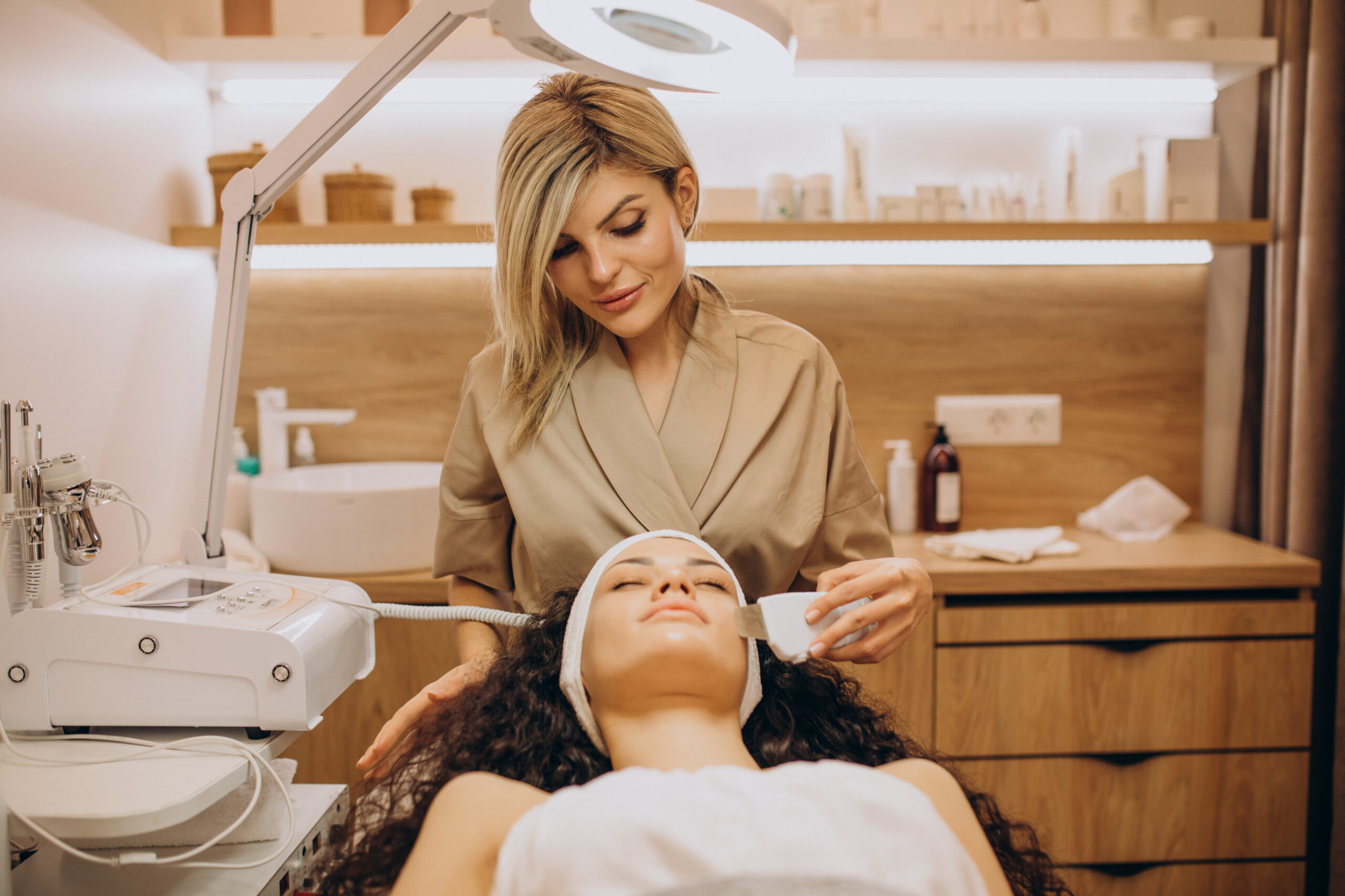 Woman at cosmetologist making beauty procedures